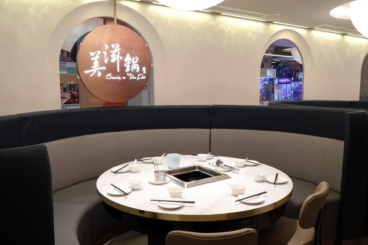 Spacious and elegantly designed main dining hall at Beauty in The Pot, ideal for group gatherings