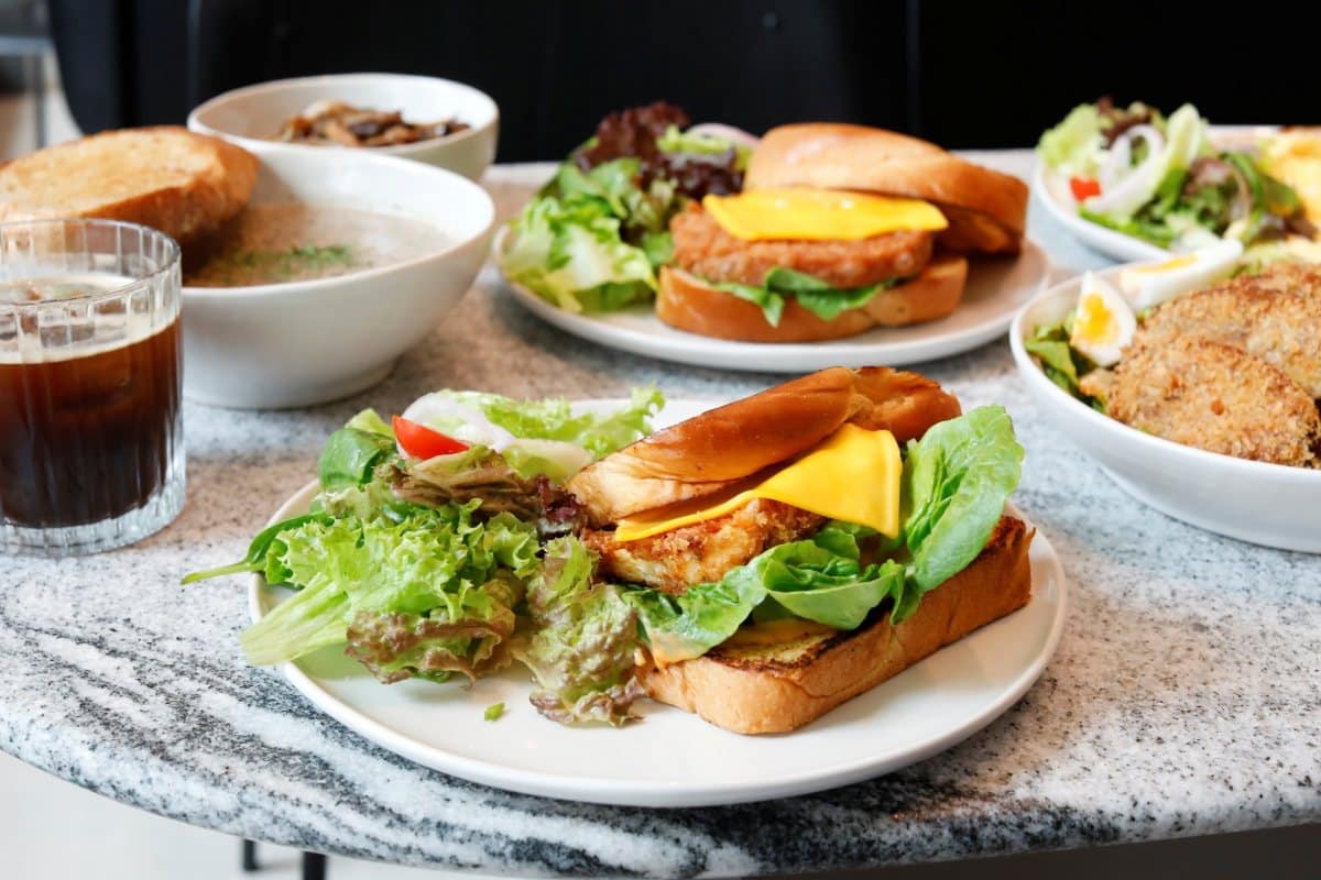 Lucine by LUNA’s vegetarian Tofu Katsu Sando with cheddar, lettuce, and sriracha mayo